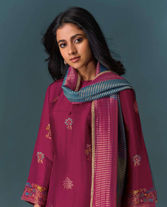 Deep maroon colour suit material with Olivia silk jacquard top featuring elegant digital prints, paired with classic silk bottoms, and completed with a silk jari lining dupatta highlighted by digital prints