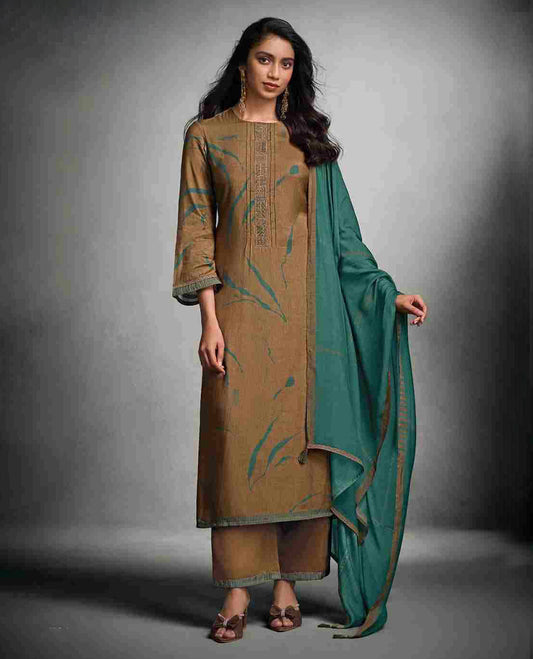 Light brown colour suit material with pakiza silk digital print top with embroidery worked sleeve, paired with matching satin bottom and contrast colour pakiza light weight print with embroidery lace dupatta.