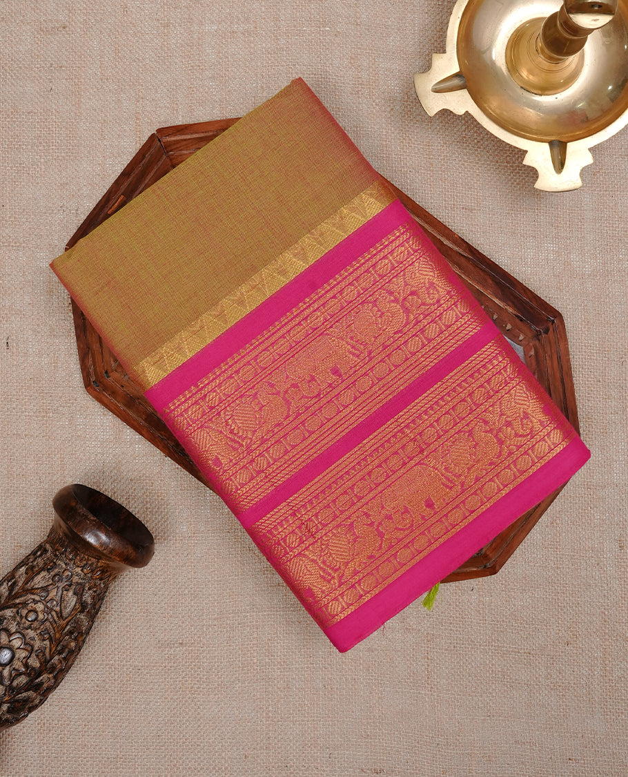 Olive Colour Chettinad cotton saree featuring elegant plain body , complemented by contrast Magenta colour with traditional border, comes with matching blouse piece.