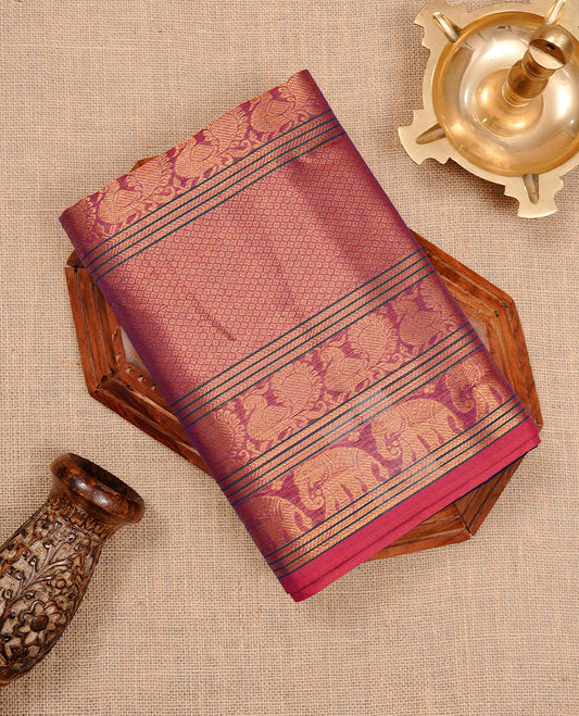 Navy blue colour chettinad cotton saree featuring Elegant plain body, complemented by magenta colour with traditional border, paired with matching blouse piece.