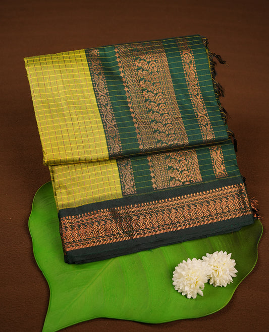 Lemon colour kalyani cotton saree featuring Antique zari check pattern on body, contrast Green colour border with antique zari pattern, paired with matching blouse piece.