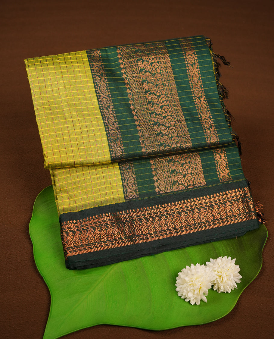 Lemon colour kalyani cotton saree featuring Antique zari check pattern on body, contrast Green colour border with antique zari pattern, paired with matching blouse piece.