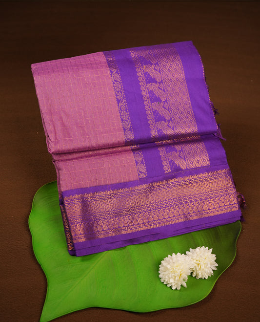Lavender colour kalyani cotton saree featuring Antique zari check pattern on body, contrast Indigo colour border with antique zari pattern, paired with matching blouse piece.