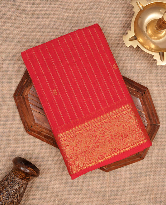 Red colour chettinad cotton saree featuring gold zari stripes on body, self colour with zari border, paired with matching blouse piece.