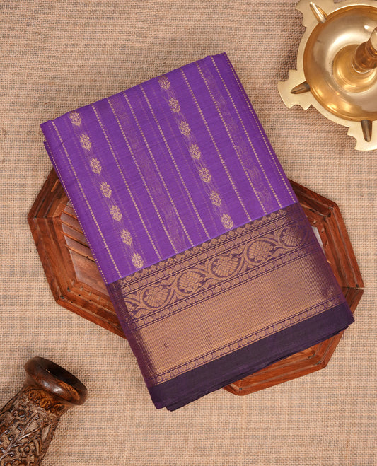 Medium Purple colour chettinad cotton saree featuring gold zari stripes on body, complemented by gold zari border, paired with matching blouse piece.