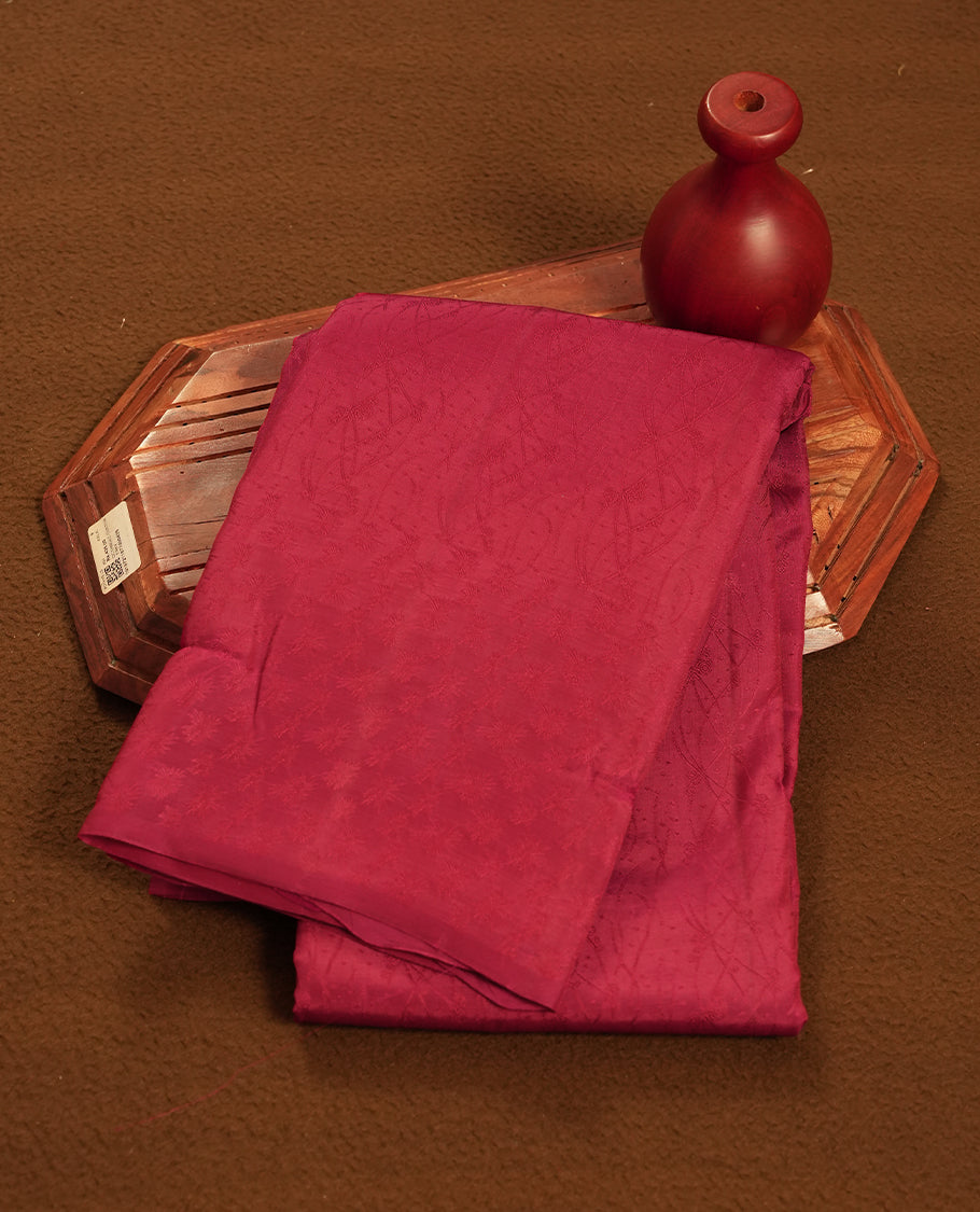 Maroon Colour Semi Soft Silk Saree Featuring a Self Coloured Patterned Body, Complemented by Self Coloured Pallu & Border and a Matching Blouse Piece