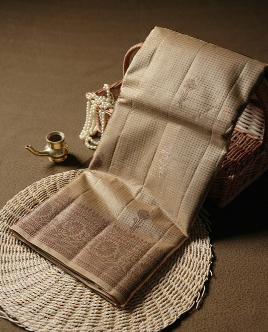 Natural Pine colour pure banarasi tussar Saree with antique design on the body, accentuated with an elegant  traditional border, rich woven pallu and matching blouse piece.