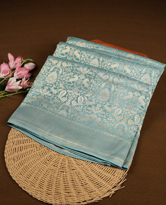 Light Blue colour Mysore Crepe Silk saree fearturing gold Zari kodi visiri & Animal brocade pattern on body and self colour border paired with matching blouse