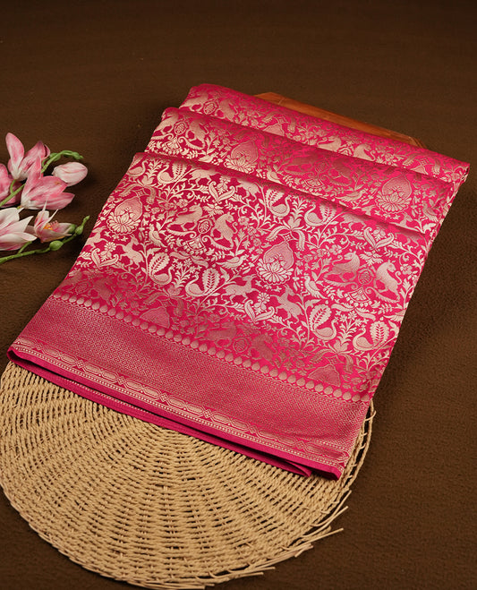 Rani Pink colour Mysore Crepe Silk saree fearturing gold Zari kodi visiri & Animal brocade pattern on body and self colour border paired with matching blouse