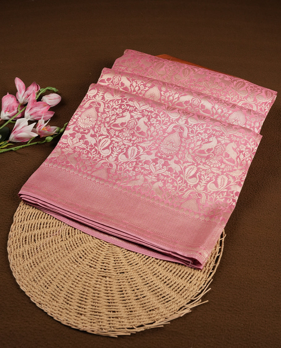 Pink colour Mysore Crepe Silk saree fearturing gold Zari kodi visiri & Animal brocade pattern on body and self colour border paired with matching blouse