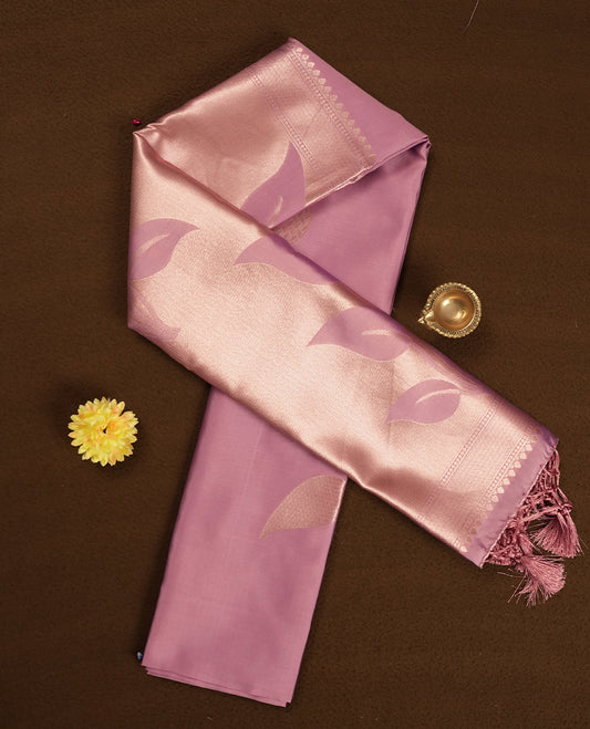 Dusty Rose Semi Silk Saree with Rose Gold Satin-Finish Pallu Featuring Bold Leaf Motifs, Geometric Zari Edging and Tassels, Paired with Coordinated Blouse Piece