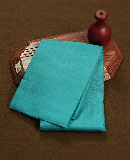 Aqua blue colour semi soft silk saree featuring a self coloured textured patterned body, complemented by self coloured motifes on pallu & border and a matching blouse piece.