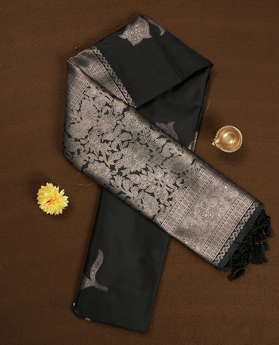 Black Semi Silk Saree with Silver Zari Floral Woven Pallu and Border, Subtle Zari Butta Motifs on the Body, Tassel Detailing, and Coordinated Blouse Piece