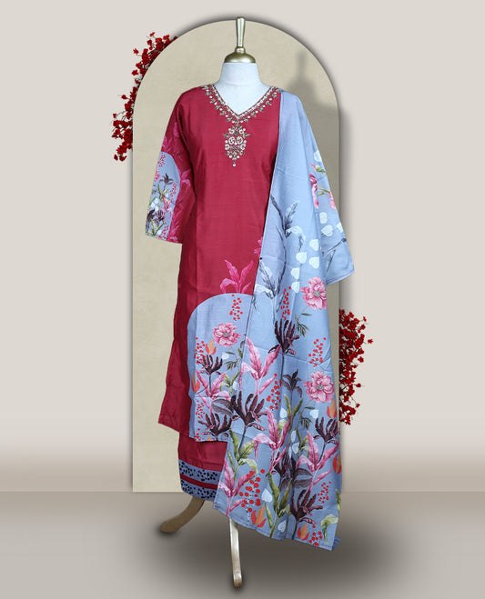 Light maroon colour churidhar set with sequin and bead embroidered neckline, paired with a light grey floral printed dupatta and matching bottom & A graceful choice for festive gatherings and casual outings.