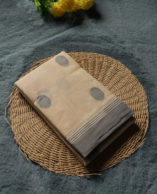 Cream colour Silk Cotton Saree with Grey Woven Polka Buttas on the Body, Minimal Grey Stripe Border, Ornate Grey Jacquard Pallu, and a Plain Ivory Blouse with Matching Grey Border