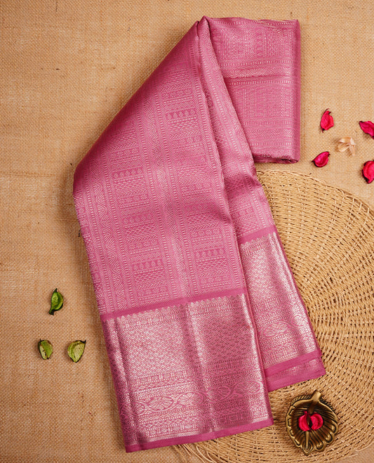 Dusty Pink colour Kanchipuram Samudrika Silk Saree featuring Geometric pattern weaving with gold zari jacquard and a traditional zari border, paired with a matching designer jacquard blouse piece