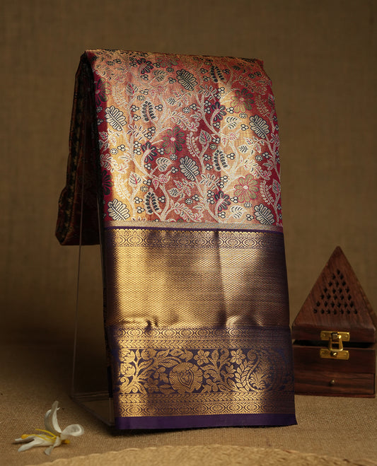 Golden colour and Antique silver Zari Tissue Brocade Saree features intricate a coloured floral Motifs on body and traditional border & pallu with floral patterns, paired with matching blouse