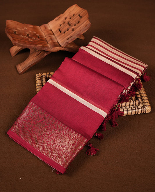 Red colour chanderi silk saree featuring white stripped print pattern across body, with Antique zari pattern border and paired with matching blouse.