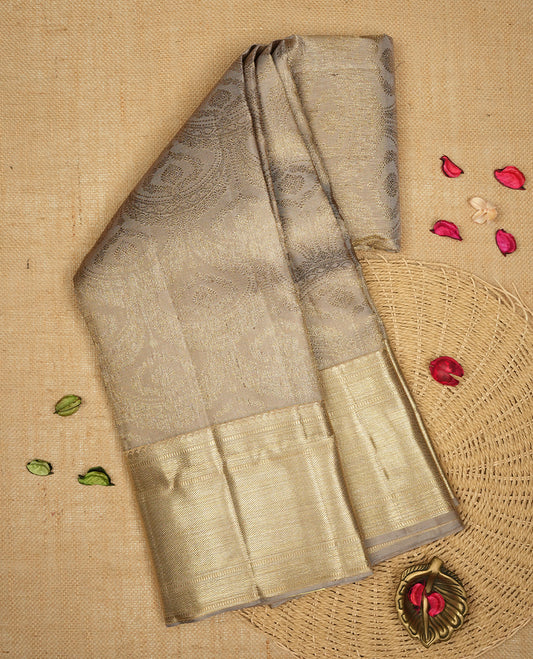 Ashy colour Kanchipuram Samudrika Silk Saree featuring antique zari pattern weaving with Antique zari jacquard and a traditional zari border, paired with a matching designer jacquard blouse piece