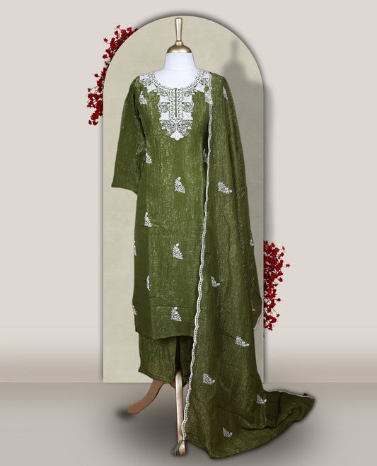 Green colour churidar set featuring elegant white thread embroidery on the neckline, sleeves, and scattered motifs across the body, Paired with a matching embroidered dupatta, this ensemble radiates graceful charm and festive appeal.