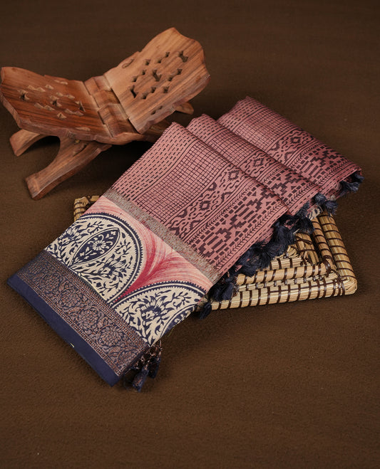 Pink colour chanderi silk saree featuring geometric print pattern across body, with contrast Blue colour border with zari pattern and paired with matching blouse.