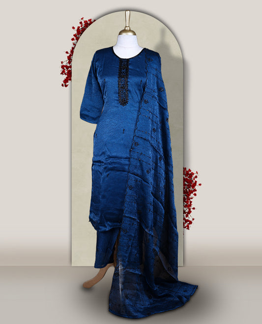 Blue churidar set adorned with intricate black cut bead work on the neckline, paired with a matching bottom & The set comes with a lightweight embroidered dupatta, adding elegance and charm to your ethnic look.