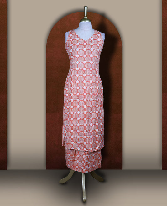 Peach colour cotton cord set with geometric off white prints, featuring a straight kurta with stylish sleeveless with side slits, paired with coordinated bottoms.