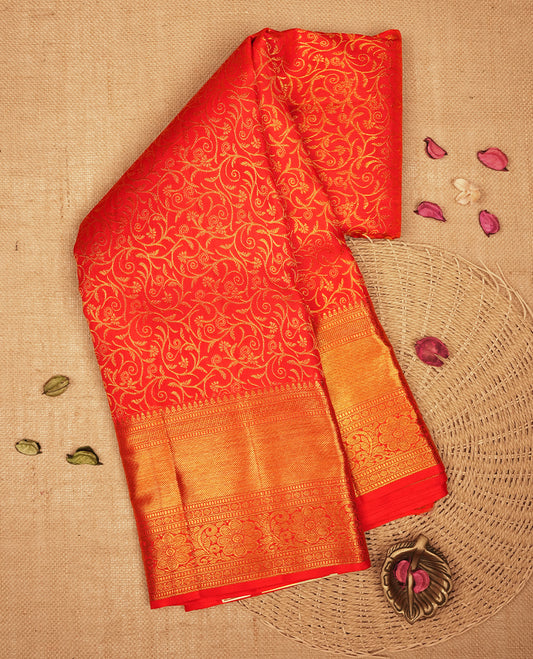 Red colour Kanchipuram Samudrika Silk Saree featuring Floral kodi pattern weaving with gold zari jacquard and a traditional zari border, paired with a matching designer jacquard blouse piece