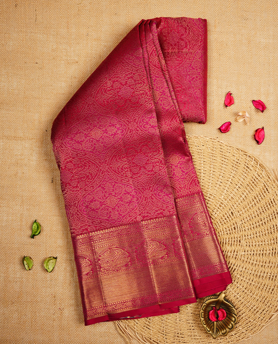 Magenta purple colour Kanchipuram Samudrika Silk Saree featuring Floral kodi pattern weaving with gold zari jacquard and a traditional Kanchipuram zari border, paired with a matching designer jacquard blouse piece