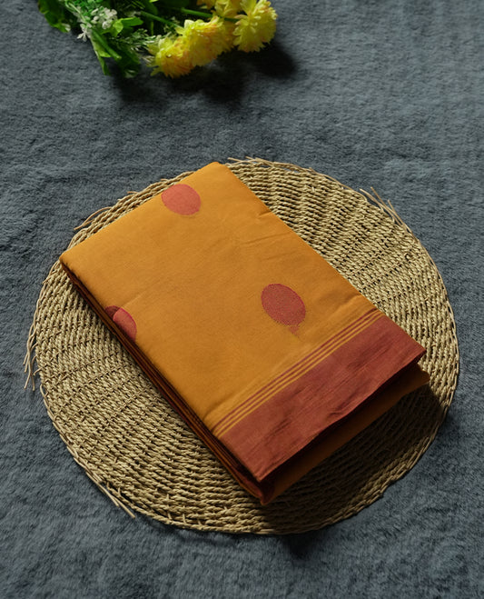 Orange Silk Cotton Saree with Red Orange Buttas Body, Accented by Red Orange Brocade and Wavy Zari Border on Red Pallu, Paired with Matching Blouse Piece