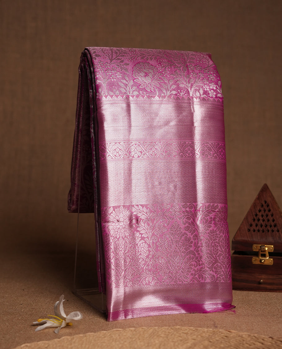 Pink colour and Antique silver Zari Tissue Brocade Saree features intricate floral Motifs on body and fancy border & pallu with floral patterns, paired with matching blouse
