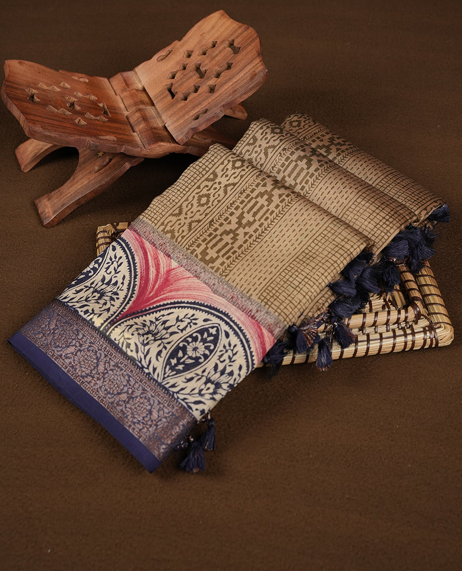 Khaki colour chanderi silk saree featuring geometric print pattern across body, with contrast Blue colour border with zari pattern and paired with matching blouse.