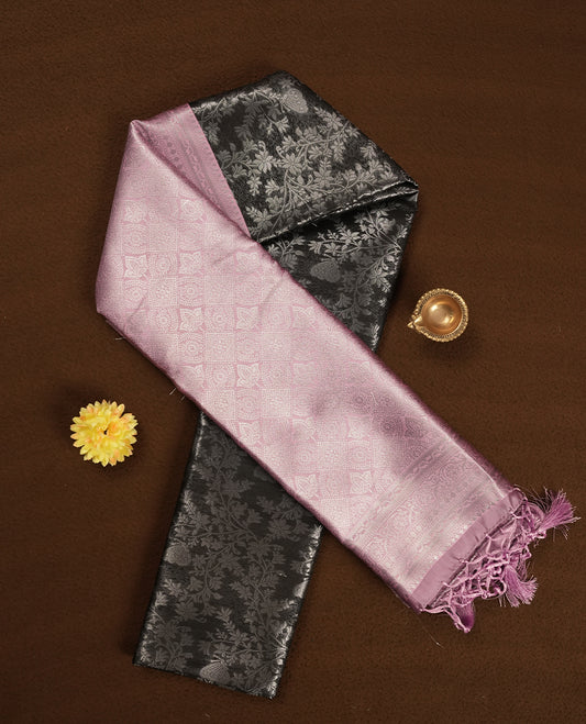 Charcoal Black colour Semi Silk Saree with Silver Zari Floral Self-Weave on the Body, Contrasting Pastel Mauve Zari Woven Pallu and Border with Intricate Geometric Motifs and Tassels, Paired with Coordinated Blouse Piece