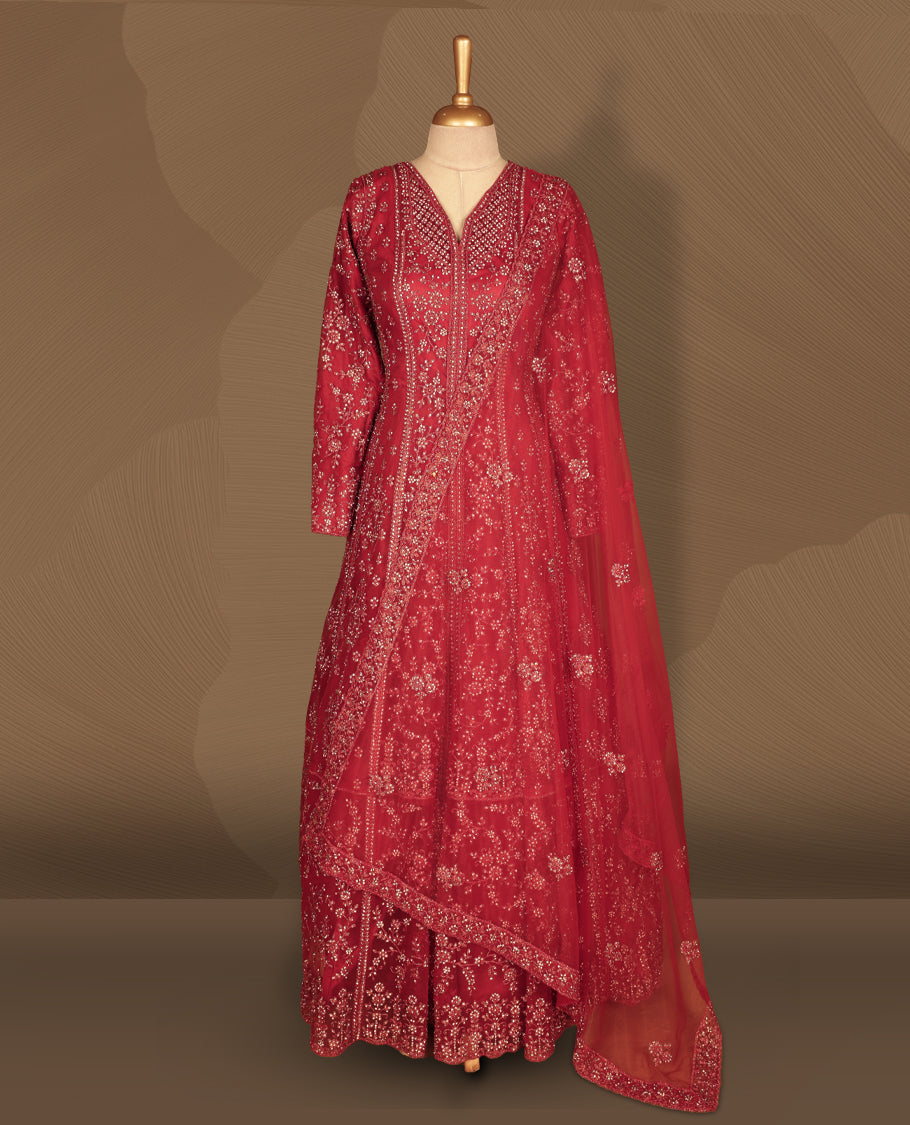 Deep red colour fully embroidered stitched gown set with V‑neckline, full sleeves, all‑over sequin and bead floral work, and matching net dupatta with heavily embellished border.