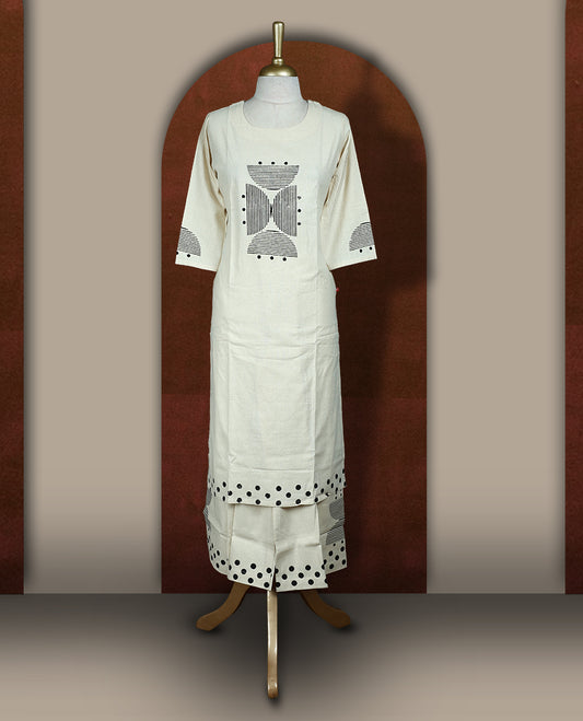 Cream colour cotton coord set with bold geometric prints and a pop of black, Features a round neck kurta with 3/4th sleeves and matching straight pants.