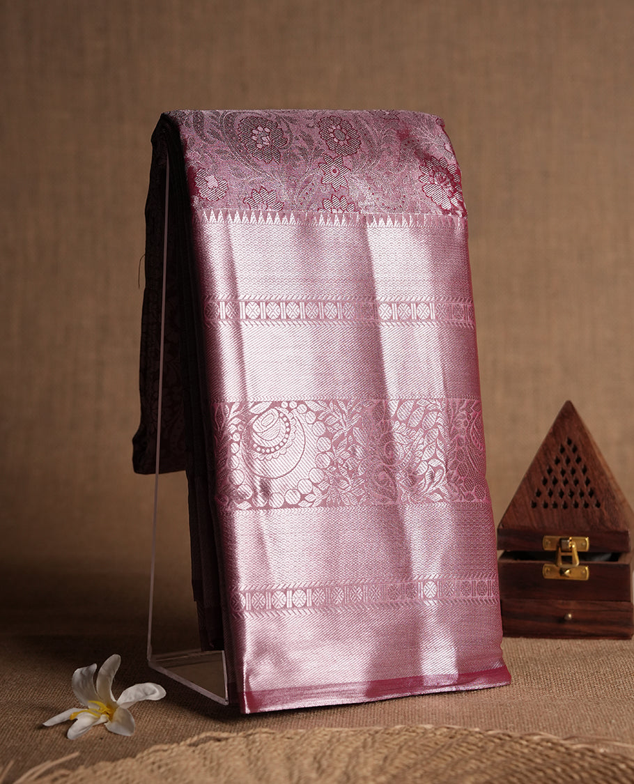 Soft red colour and Antique silver Zari Tissue Brocade Saree features intricate floral Motifs on body and traditional border & pallu with floral patterns, paired with matching blouse