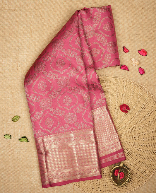 Onion Pink colour Kanchipuram Samudrika Silk Saree featuring Floral kodi pattern weaving with gold zari jacquard and a traditional zari border, paired with a matching designer jacquard blouse piece