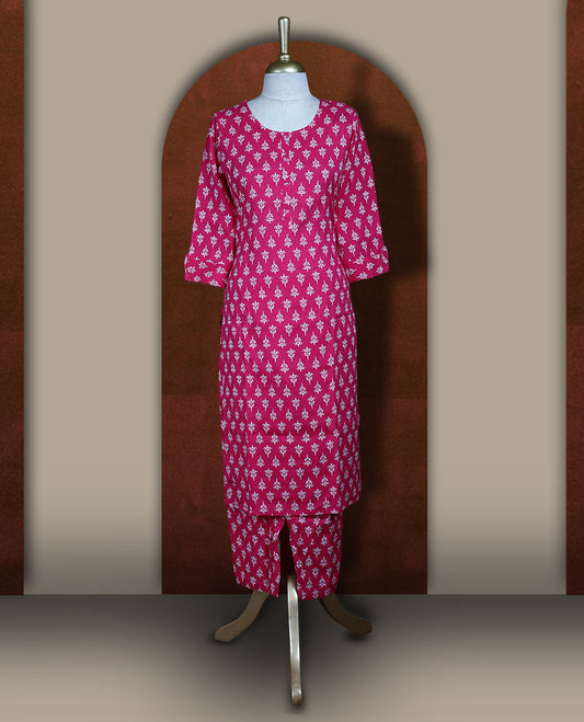 Magenta colour coord set adorned with all over floral prints, featuring a straight cut kurta with round neckline and 3/4th sleeves, paired with matching bottoms.