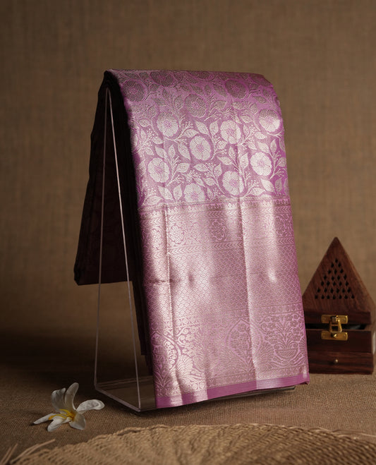 Taffy pink colour and Antique gold Zari Tissue Brocade Saree features intricate floral Motifs on body and traditional border & pallu, paired with matching blouse