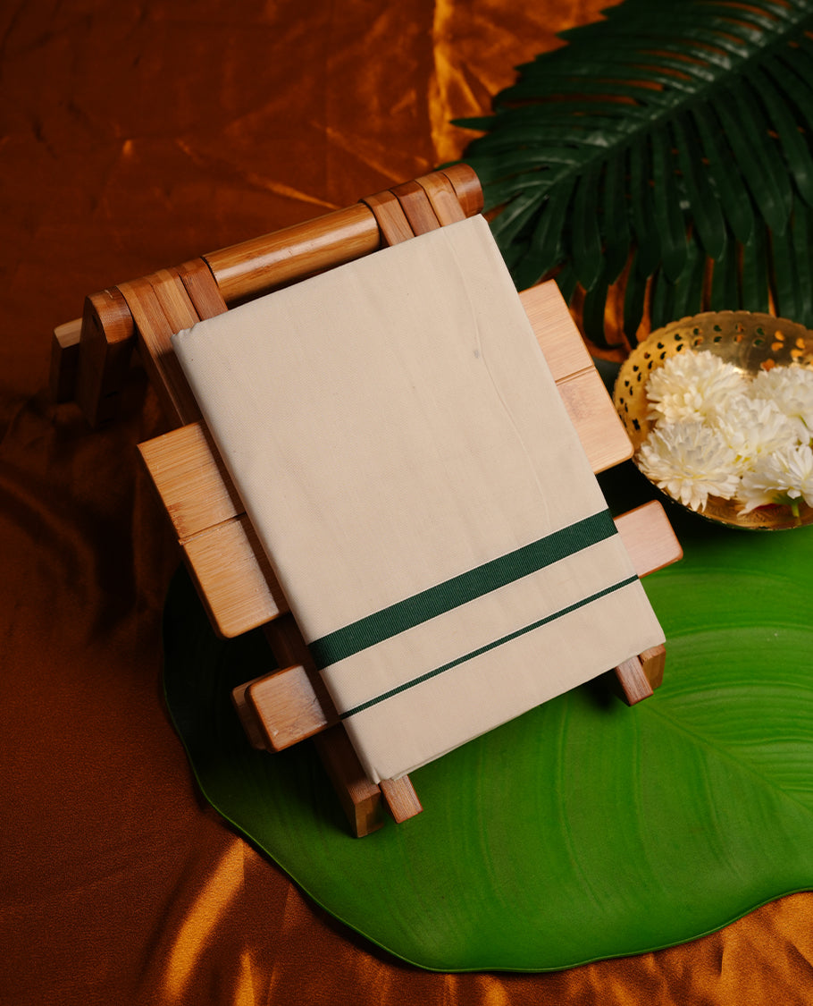 Cream colour MCR cotton single dhoti featuring green colour simple border