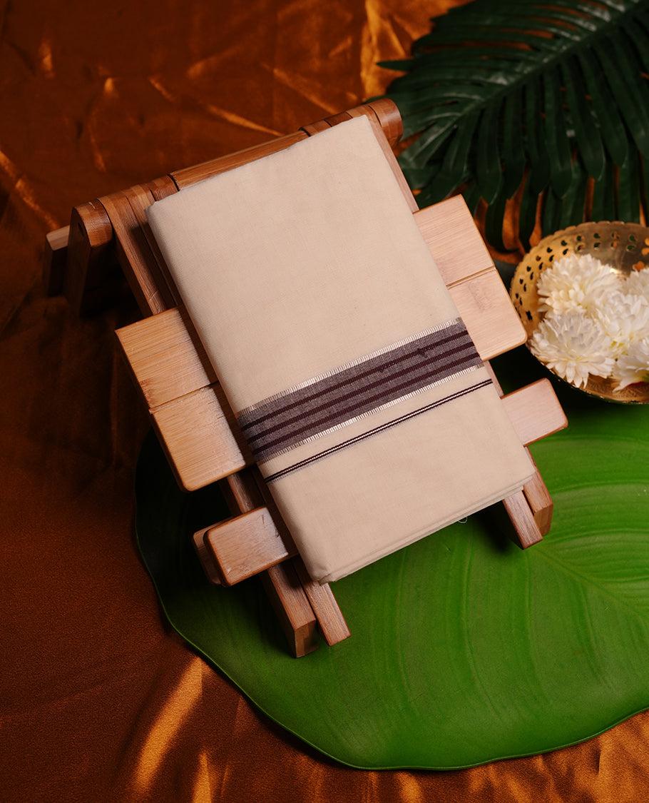 Cream colour cotton double dhoti featuring brown colour border with silver zari border
