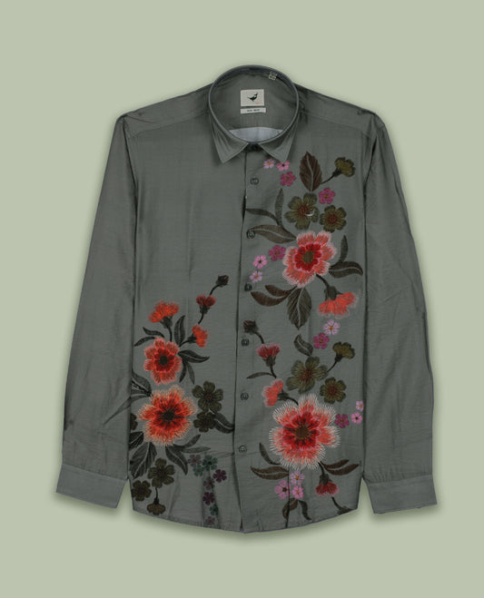Grey colour full sleeve shirt features a rounded spread collar and a watercolor style floral print in orange, majenta, and green & its ideal for both casual days and laid back evenings.