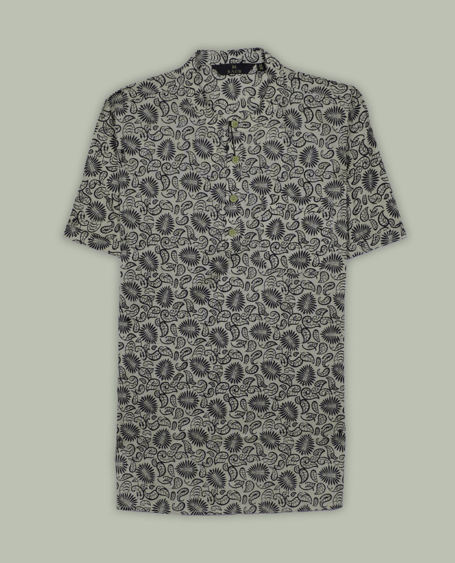 Beige colour short sleeve shirt with black floral and paisley print, featuring a classic chinese collar and wooden button half placket, A breezy and stylish pick for both relaxed days and casual evenings.