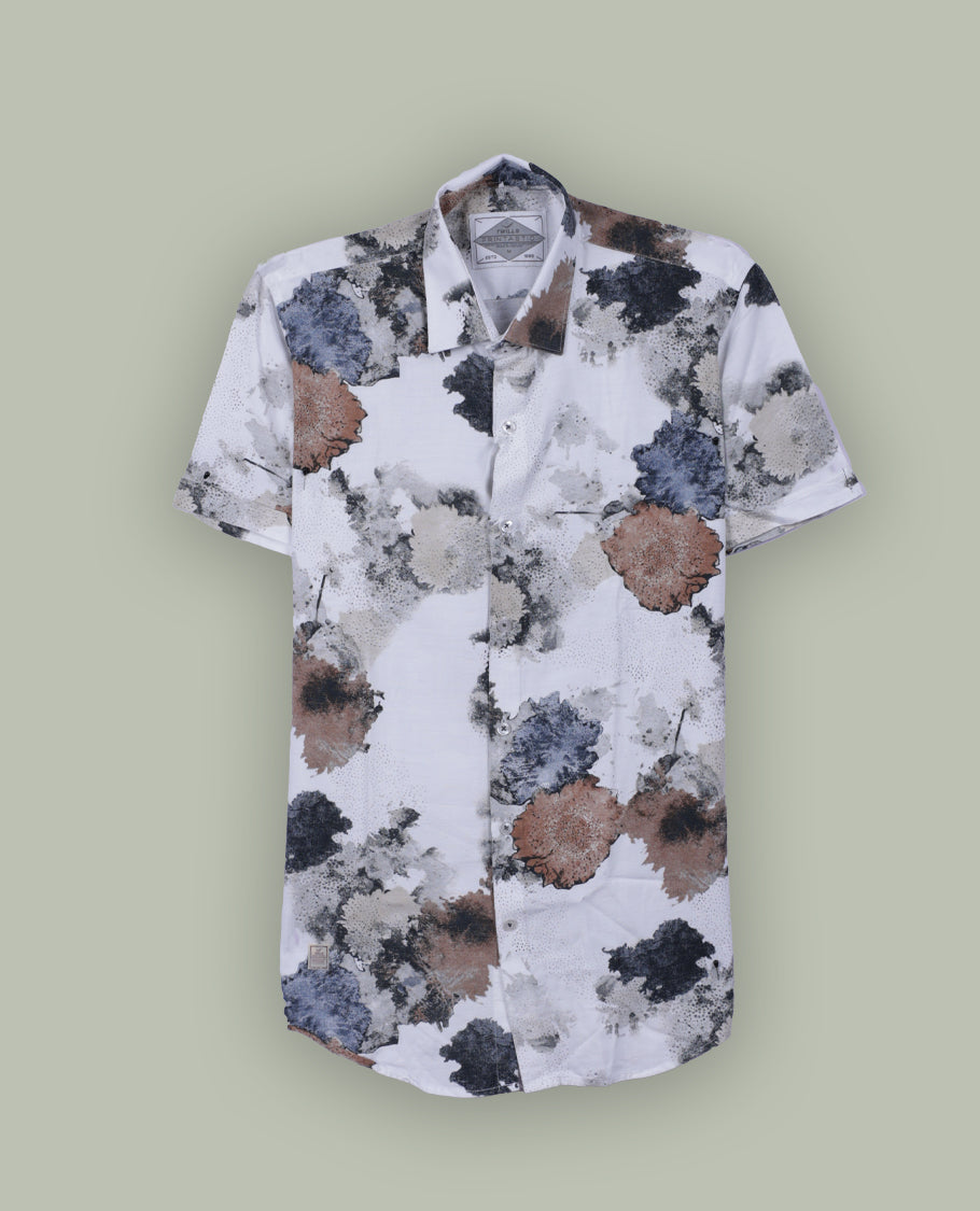 White colour short sleeve shirt features a rounded spread collar and a watercolor style floral print in brown, black, and blue & its ideal for both casual days and laid back evenings.