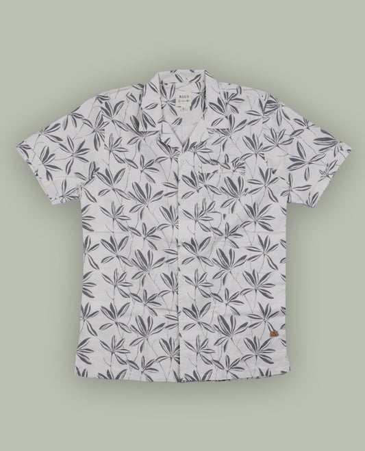 Off white colour short sleeve shirt features a rounded spread collar and a grey colour jacquard print all over & its ideal for both casual days and laid back evenings.