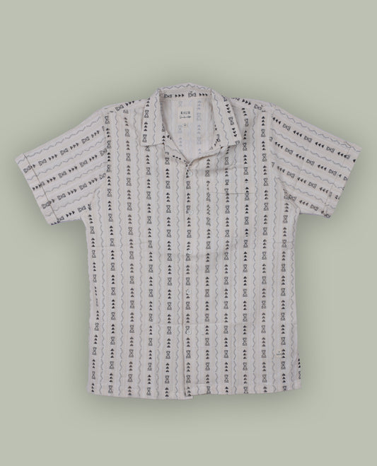 Off white colour shirt adorned with black geometric prints, Designed with a classic collar and short sleeves, it blends effortless style with everyday comfort.