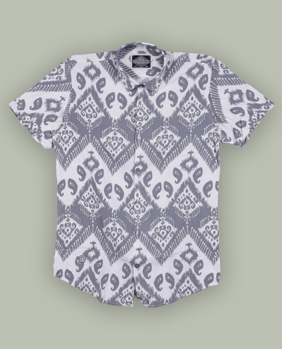 Off white colour shirt featuring stylish grey prints all over, Designed with a classic shirt collar and short sleeves, this shirt offers a modern yet casual appeal.