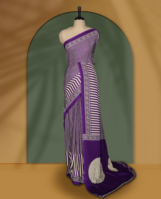 Purple and cream colour striped saree with intricate embroidered borders and bold round pallu motifs & Includes matching blouse piece.