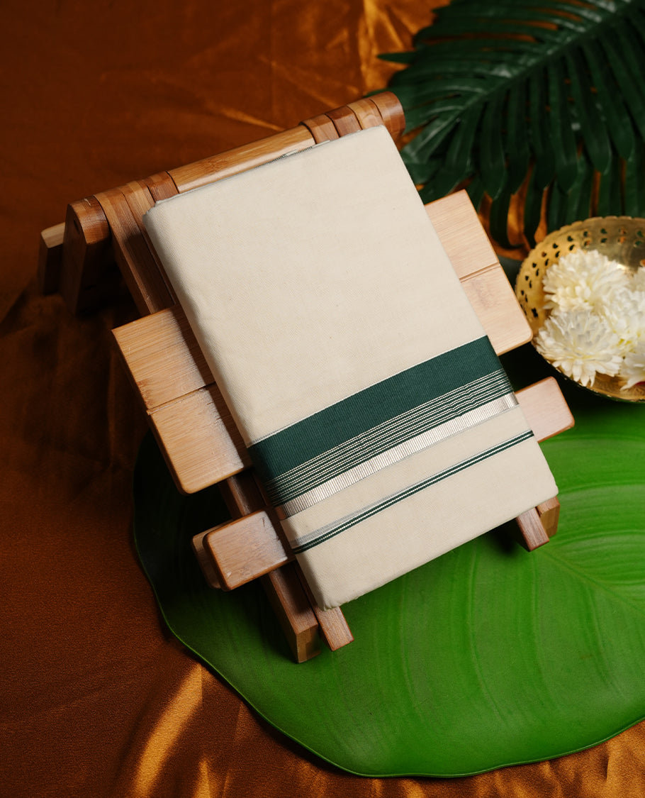 Cream colour RAMRAJ cotton double dhoti featuring green colour border with light gold zari border
