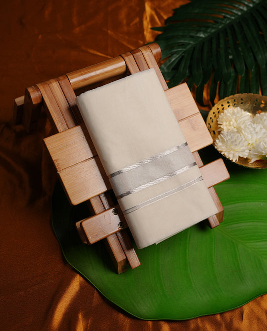 Cream colour cotton double dhoti featuring silver kasavu zari border